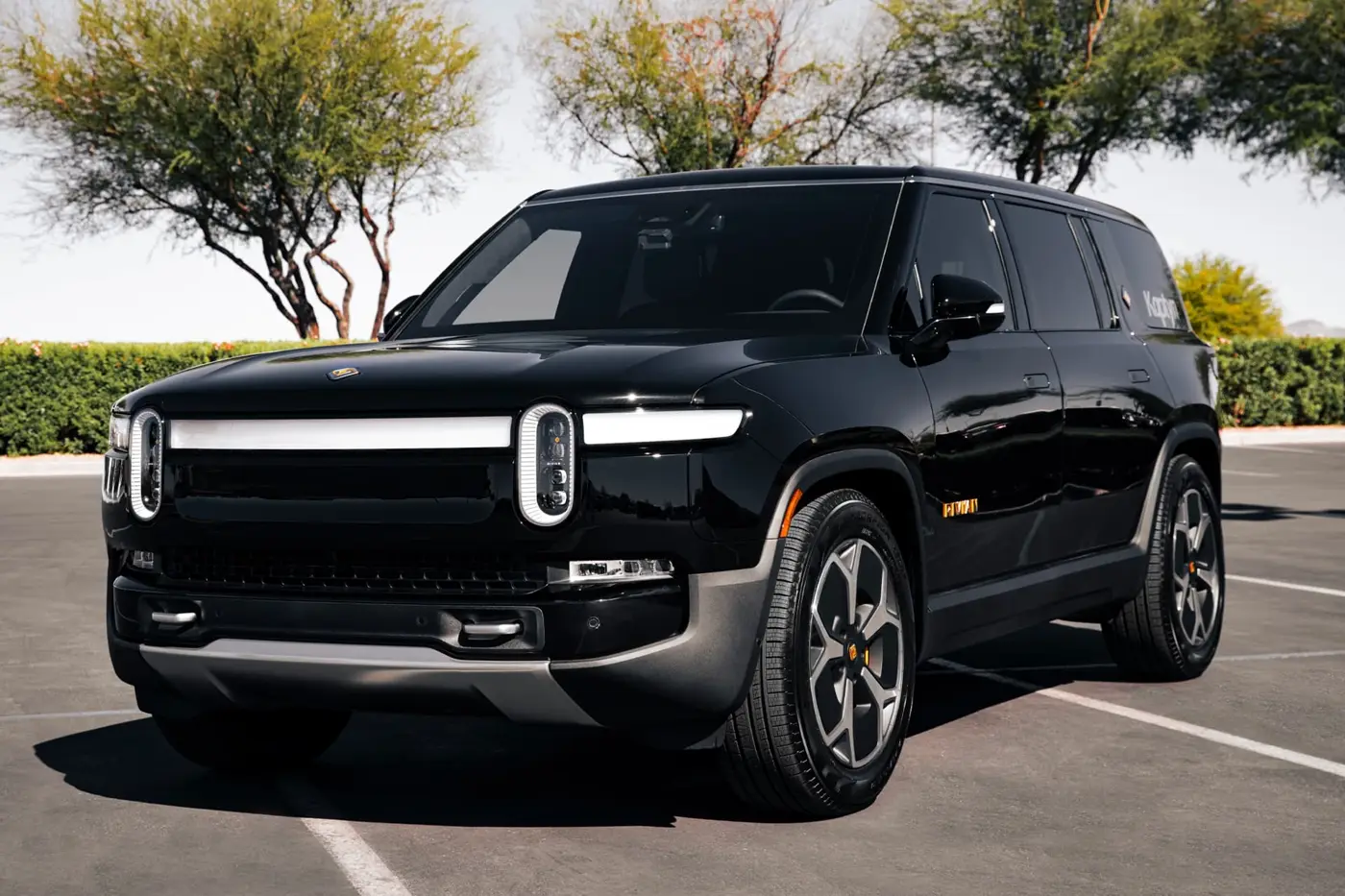 Luxe EV SUV Rivian or similar